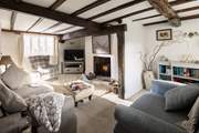 The sitting-room is stylish and cosy.