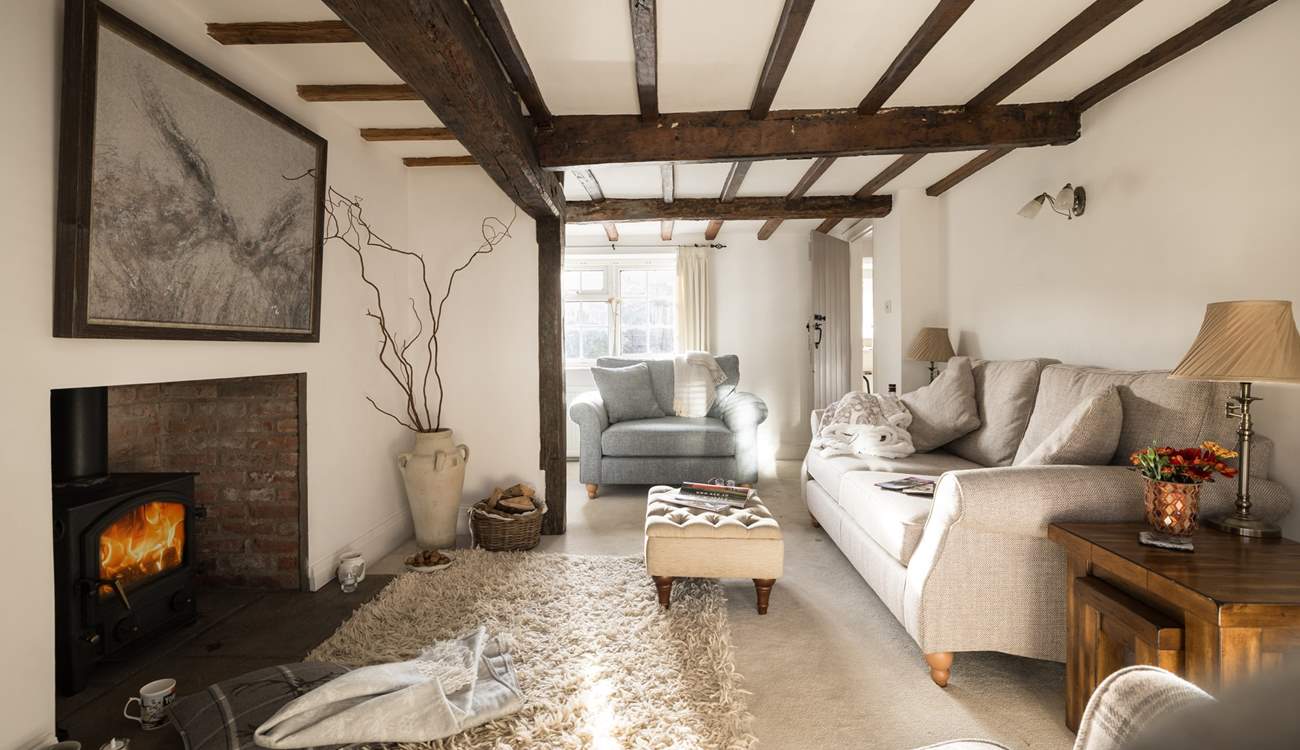 Cuddle up on the gorgeous sofa and chairs in front of the crackling wood-burner at the Old Farmhouse. 