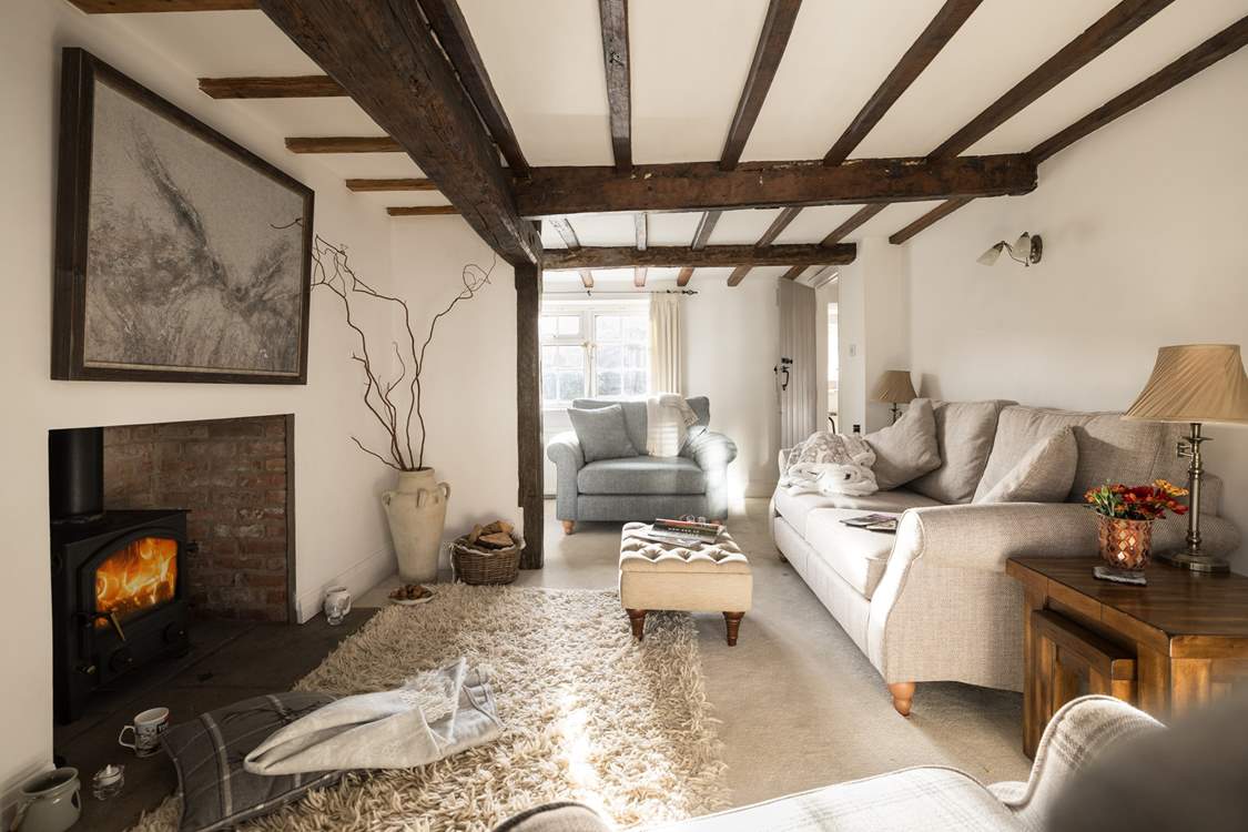 Cuddle up on the gorgeous sofa and chairs in front of the crackling wood-burner at the Old Farmhouse.