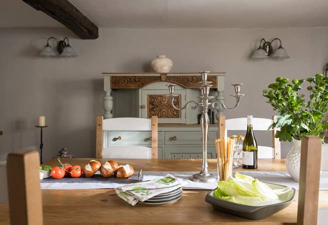 Individual vintage furniture graces the dining-room. 