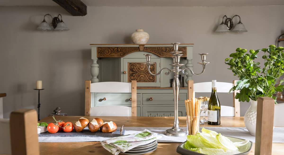 Individual vintage furniture graces the dining-room. 