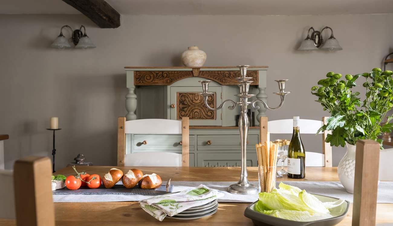 Individual vintage furniture graces the dining-room. 