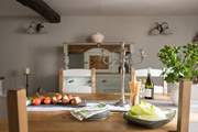 Individual vintage furniture graces the dining-room.