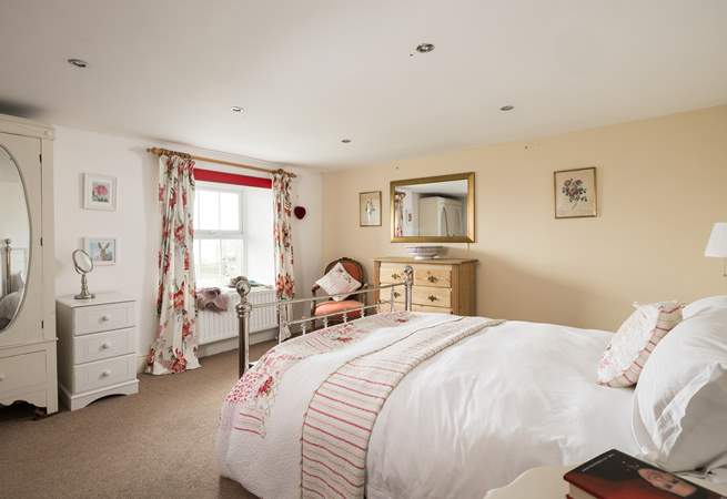 Fall asleep in this pretty country bedroom.