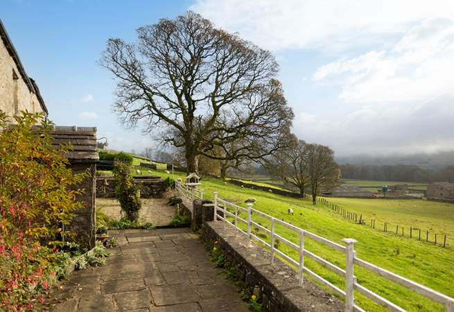 The garden overlooks the hamlet of Simonstone and plenty of sheep.