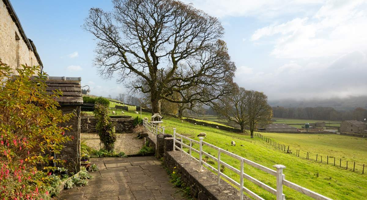 The garden overlooks the hamlet of Simonstone and plenty of sheep.