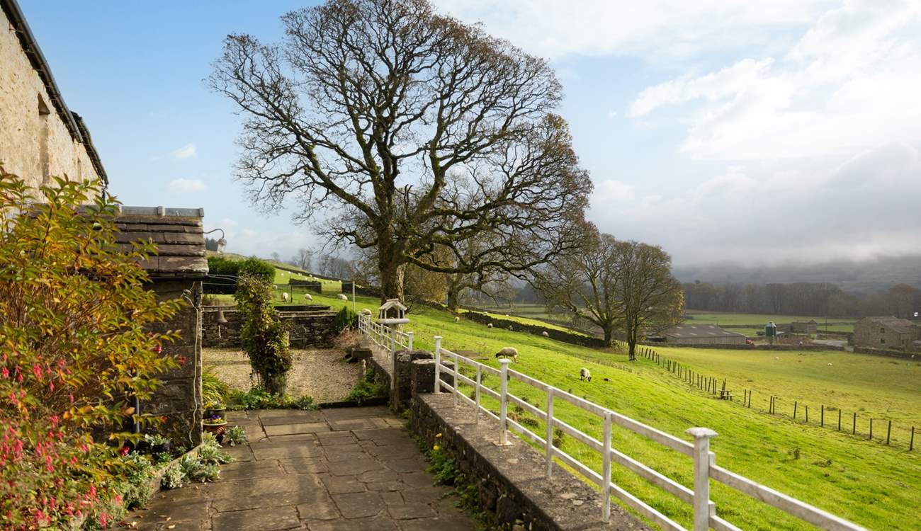 The garden overlooks the hamlet of Simonstone and plenty of sheep.