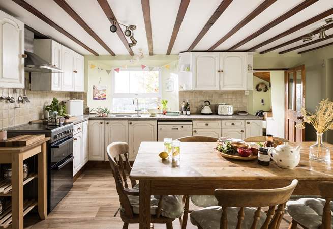 Enjoy fantastic meals around the farmhouse kitchen table.