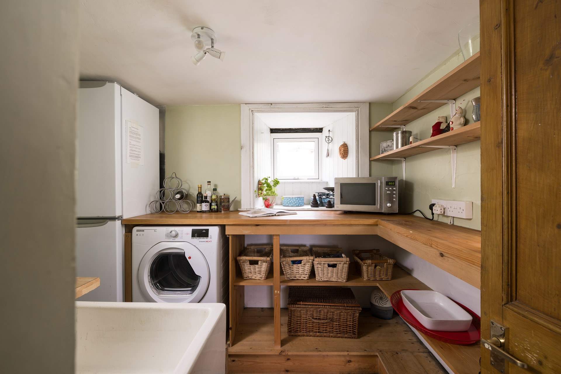 The spacious utility-room for all your laundry needs.