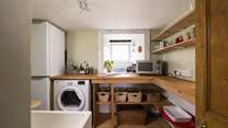 The spacious utility-room for all your laundry needs.