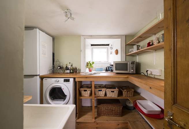 The spacious utility-room for all your laundry needs.