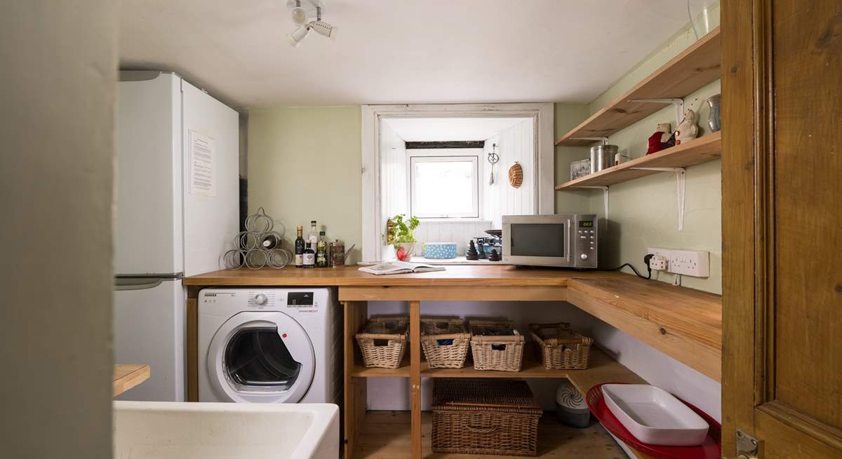 The spacious utility-room for all your laundry needs.