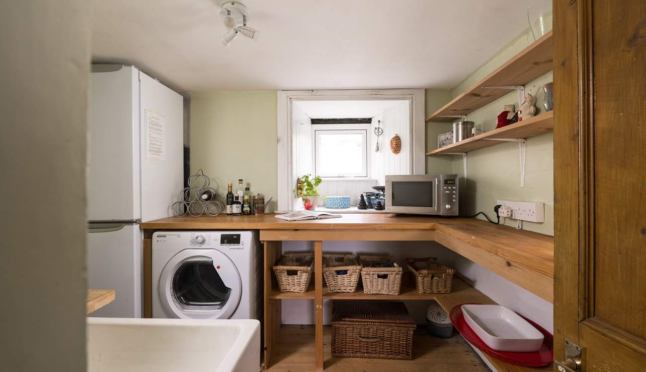 The spacious utility-room for all your laundry needs.