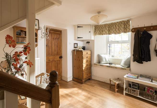 A comfy nook to rest and admire the view through the window.