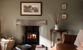 Cosy up in front of the wood-burner and relax. - Thumbnail Image