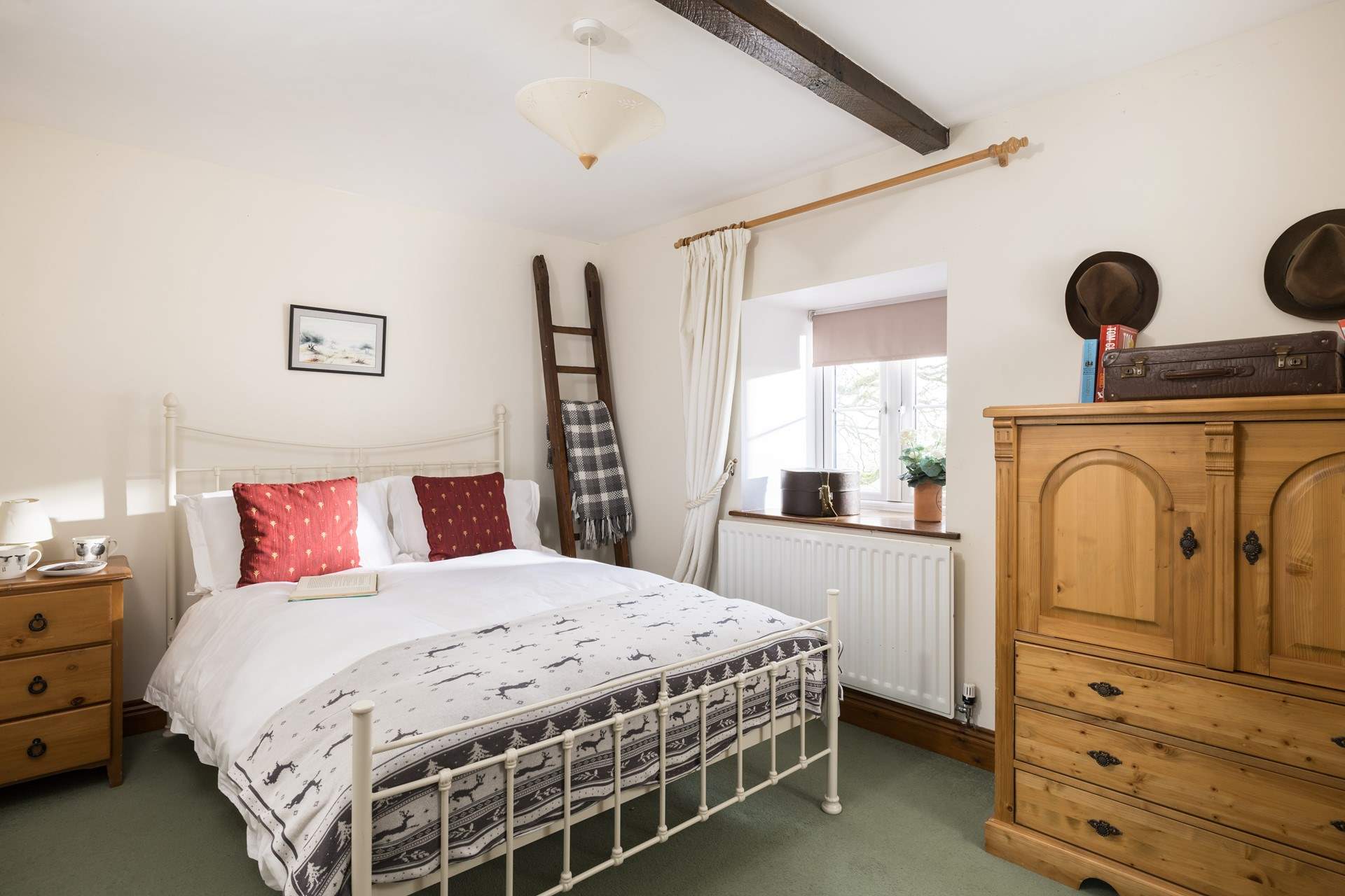 The second staircase leads to another delightful double bedroom.