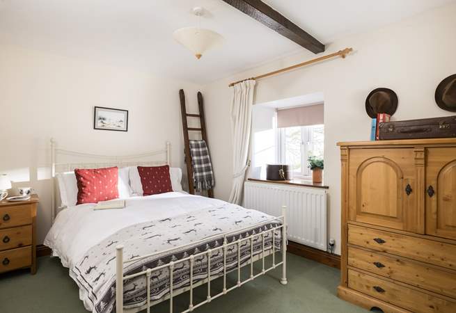 The second staircase leads to another delightful double bedroom.