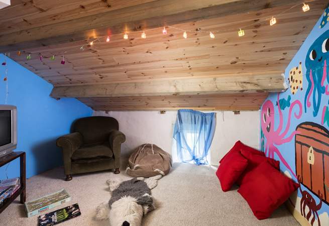 ... a cosy playroom with toys and games.