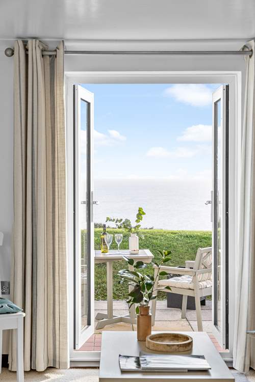 Fling open the French doors on warmer days.