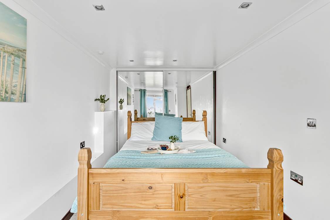 Enjoy holiday lie-ins in the king-size bed.