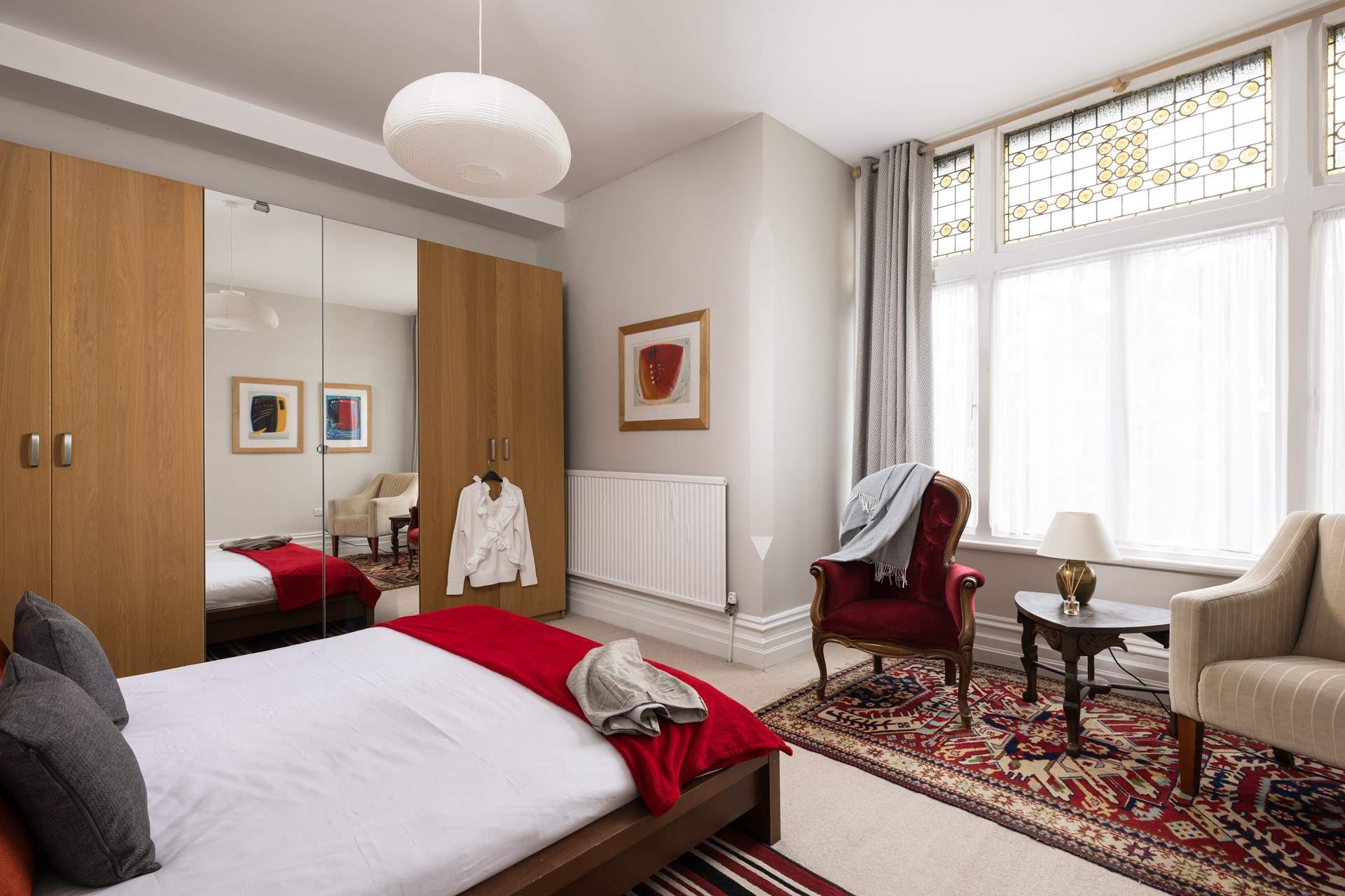 Lots of space and storage in this delightful bedroom.