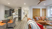 The light and airy living area is so spacious and dog-friendly too!