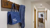 Space to hang scarfs and bags.