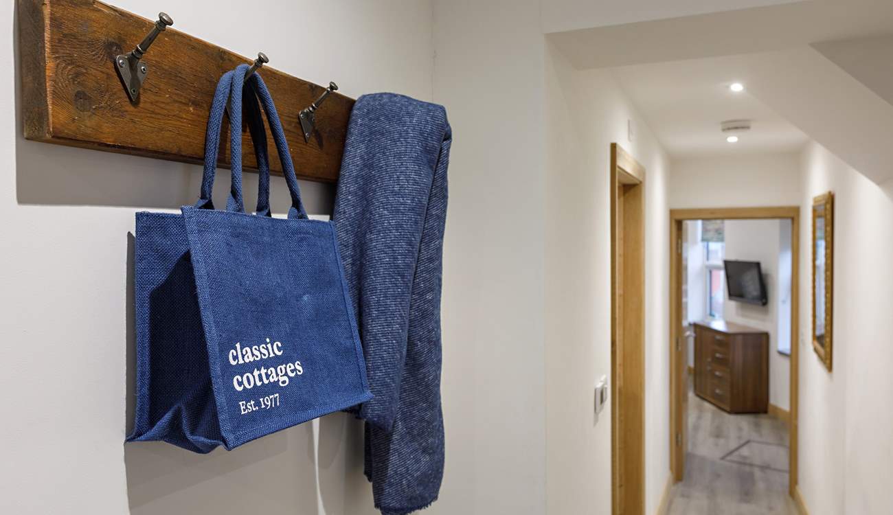 Space to hang scarfs and bags.