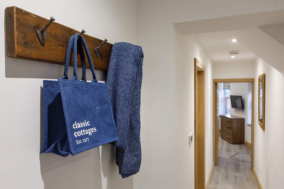 Space to hang scarfs and bags.