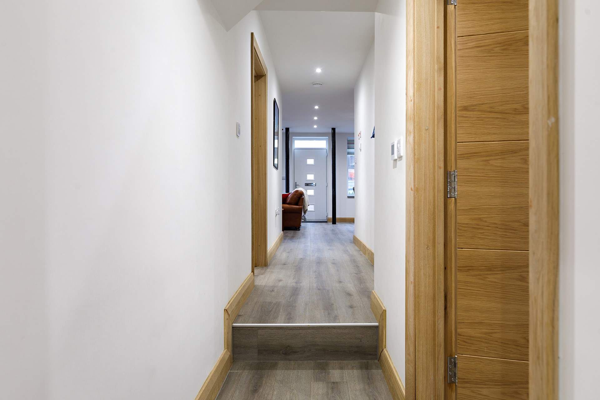 Move along the corridor and down a step to bedroom 2.