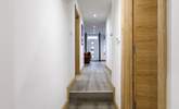 Move along the corridor and down a step to bedroom 2. - Thumbnail Image