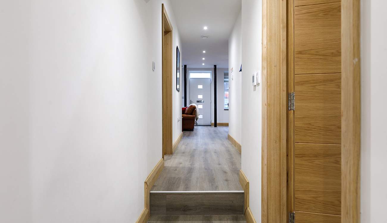 Move along the corridor and down a step to bedroom 2.
