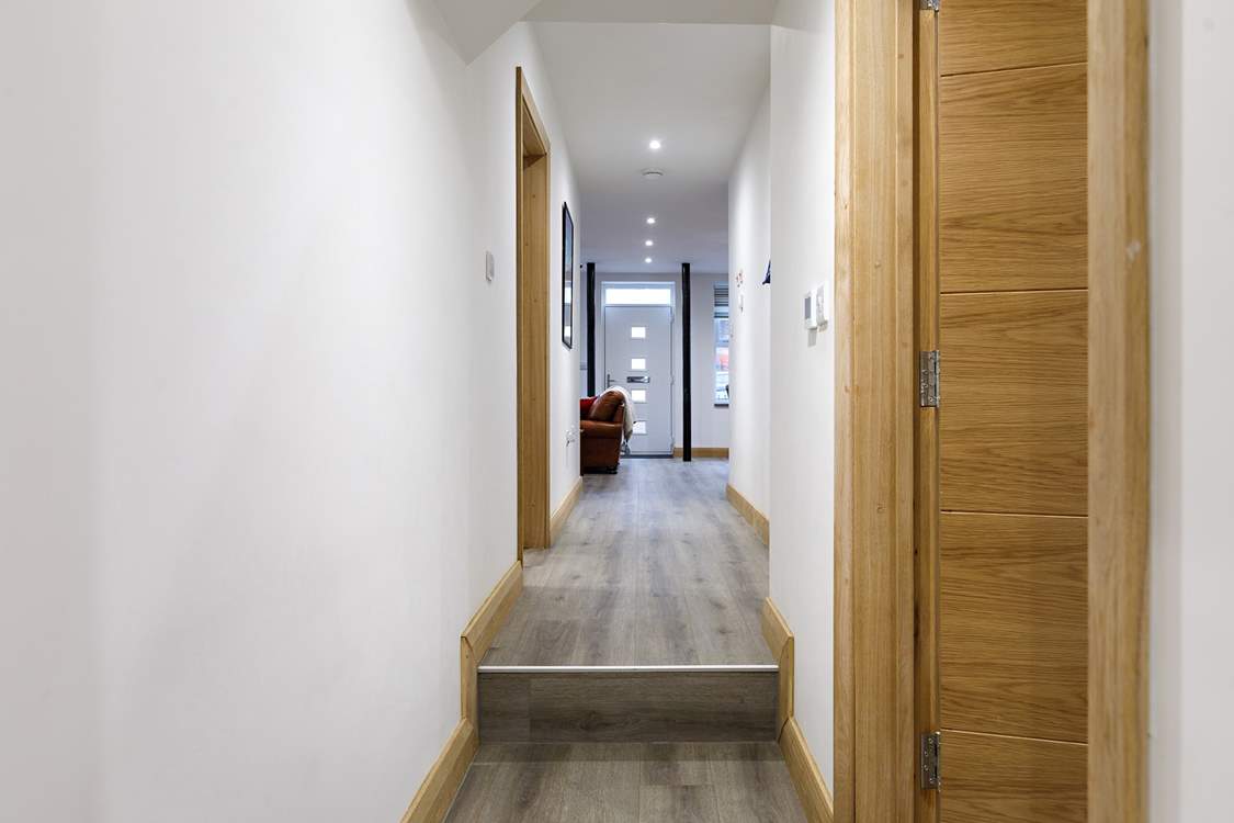 Move along the corridor and down a step to bedroom 2.