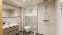 Opposite is the shower-room.