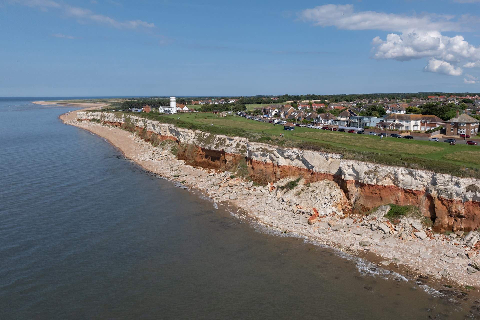 The iconic red and white stripe cliffs of Hunstanton with lighthouse.