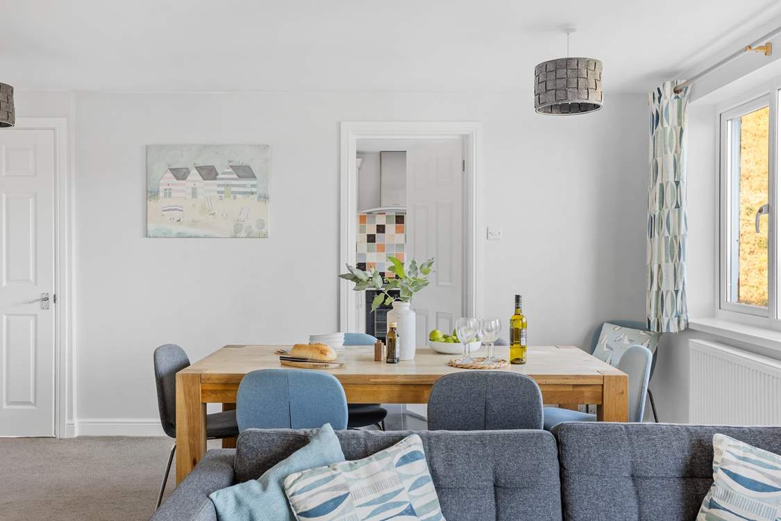 The kitchen leads off from the dining-area.