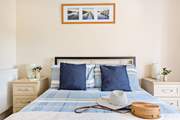 Enjoy holiday lie-ins in the king-size bed in Bedroom One.