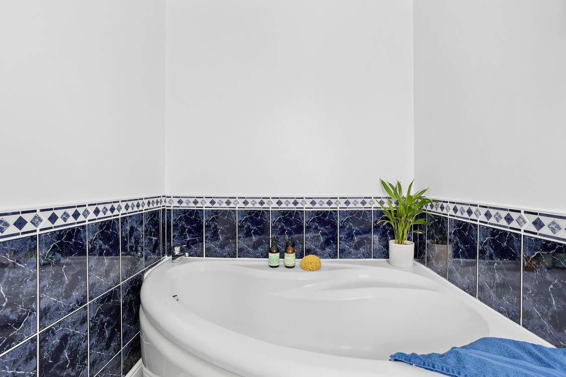 With a corner bath, it's the perfect excuse for a long leisurely soak.