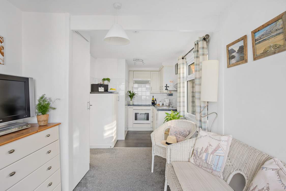 The annexe has a small lounge and kitchenette.