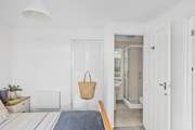 The bedroom has its own en suite.