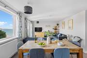 When dining in, lay the table and enjoy mealtimes together.