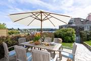 Make yourselves at home in the front garden, with delightful views over the rooftops to the sea and beyond.