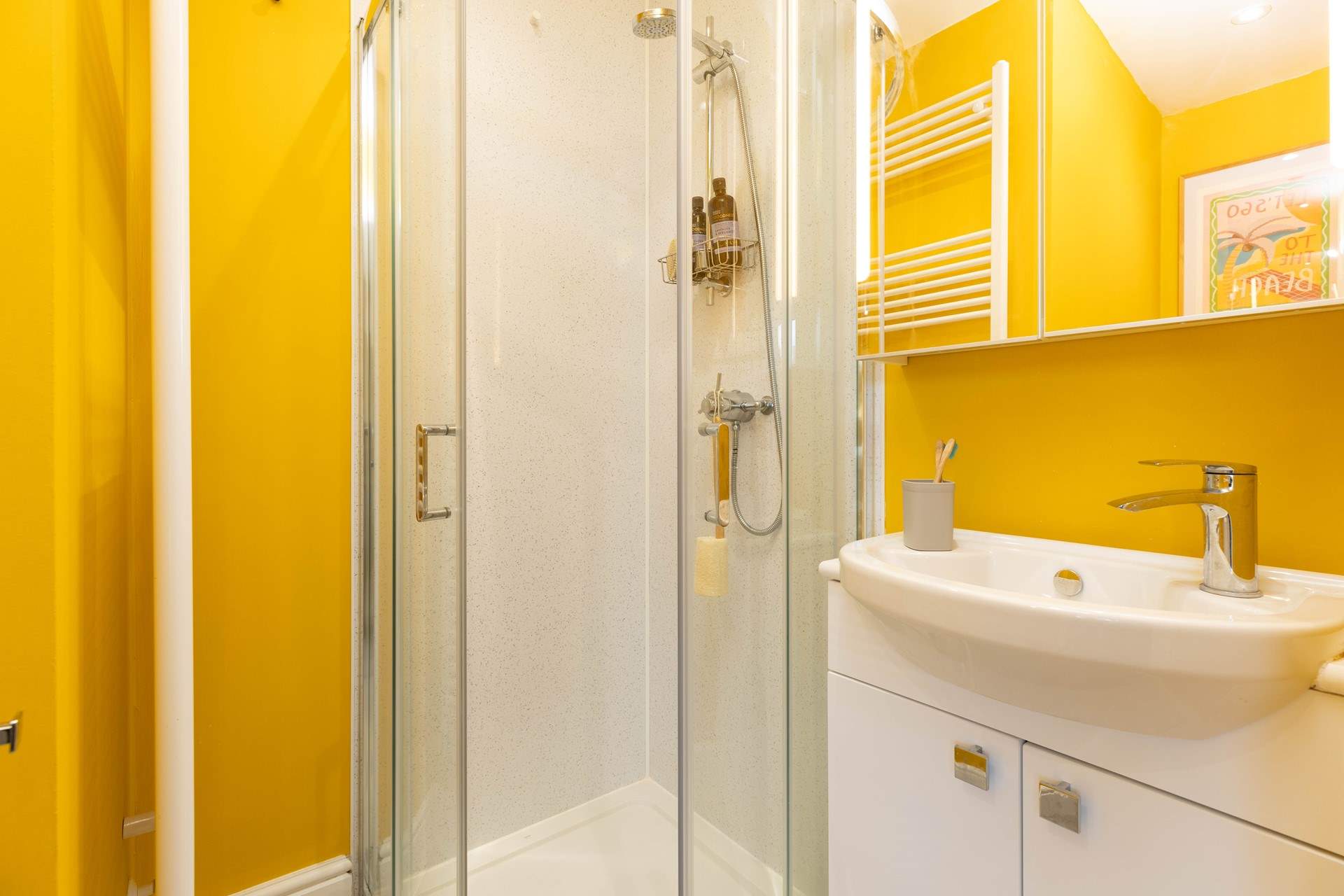 The bright and cheerful en suite shower-room.