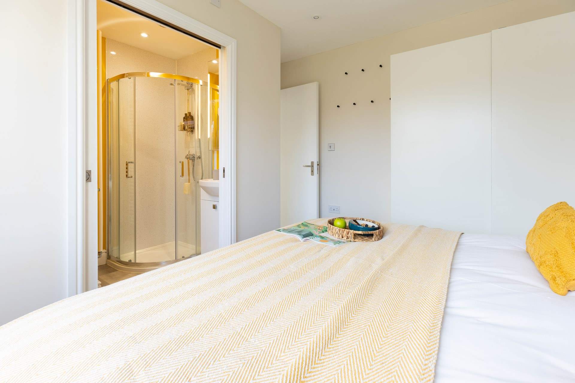 Bedroom 1 enjoys its own en suite shower-room.