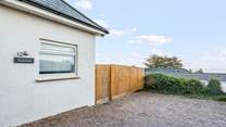 The garden can be accessed from the parking-area. Perfect for avoiding wet paws into the main house.