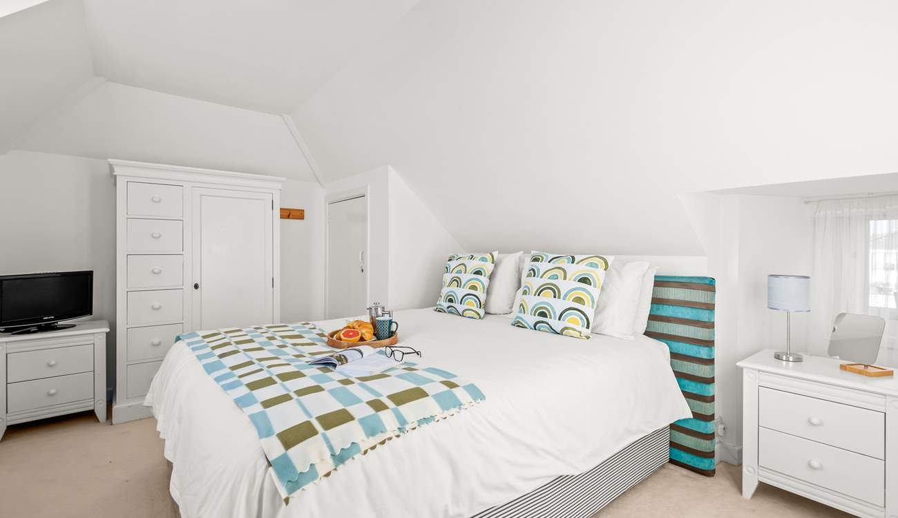 Bedroom 4 is super inviting and also boasts a TV for extra enjoyment.