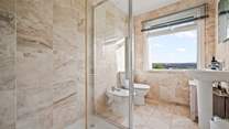Bedroom 2 enjoys this wonderful en suite.