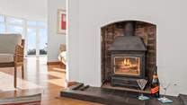 The glowing wood-burner is the perfect winter treat.