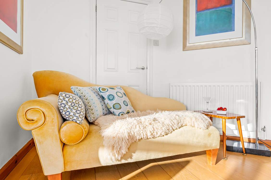 What a fabulous spot to enjoy a good book and the stunning sea views.