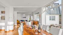 Peeking into the living-room from the dining-table.